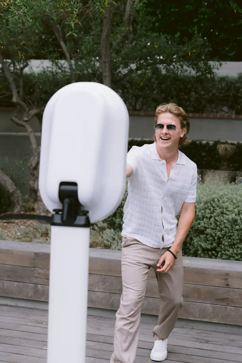 Guest laughing at a corporate photo booth rental in New Jersey